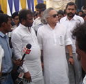 Jayram Ramesh and state minister at PRADAN stall 